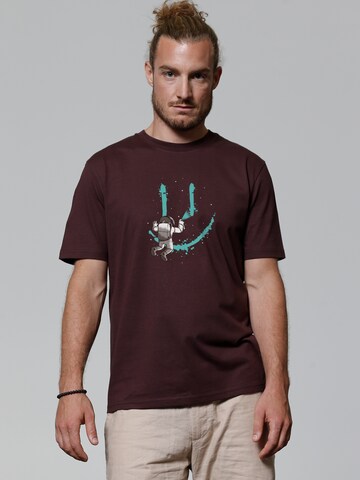 Maglietta 'Graffiti Astronaut' di Watapparel in rosso: frontale
