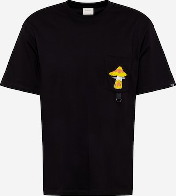 T-Shirt Filling Pieces en noir : devant