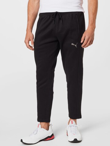 Tapered Pantaloni sport de la PUMA pe negru: față