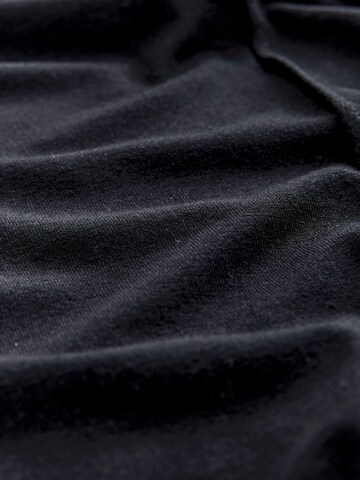 Next Tapered Housut värissä musta