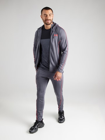 Completo per l'allenamento 'Novelity' di UNDER ARMOUR in grigio