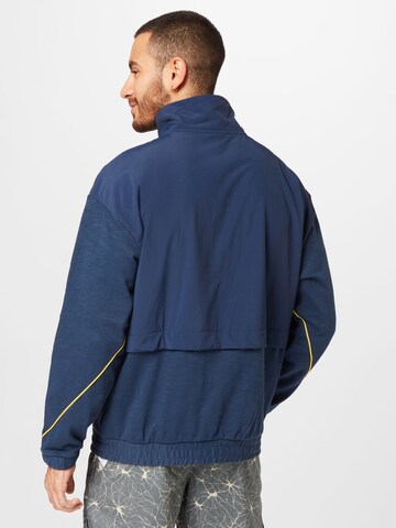 new balance Between-season jacket in Blue