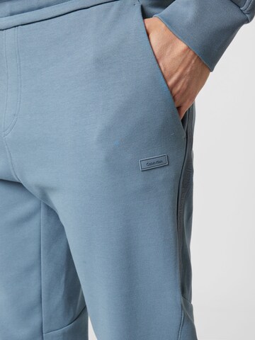 Calvin Klein Tapered Broek in Blauw