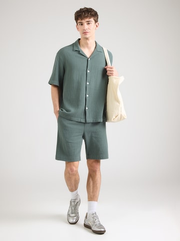 SELECTED - Ajuste confortable Ropa para correr 'SLHRLXCAL' en verde: frente