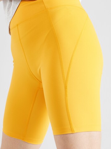 Girlfriend Collective Skinny Workout Pants in Yellow