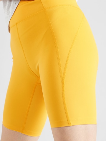 Skinny Pantalon de sport Girlfriend Collective en jaune
