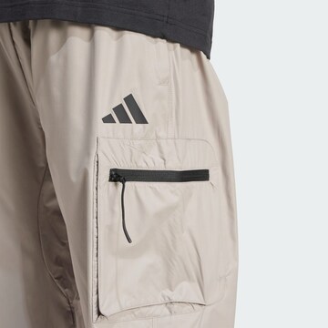 ADIDAS SPORTSWEAR Loose fit Trousers 'City Escape' in Beige