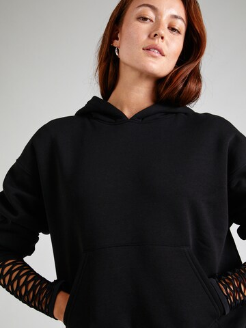 Sweat-shirt Gina Tricot en noir