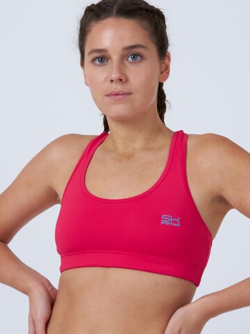 Bustier Soutien-gorge de sport 'Wide Straps' SPORTKIND en rose : devant