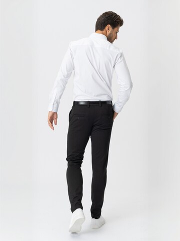 TEESHOPPEN Regular Trousers ' Performance ' in Black: back