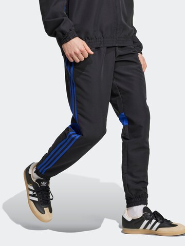 melns ADIDAS PERFORMANCE Pakapēniski sašaurināts piegriezums Sporta bikses 'Tiro 25 Essentials': no priekšpuses