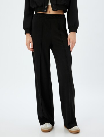 Koton Wide leg Trousers in Black: front