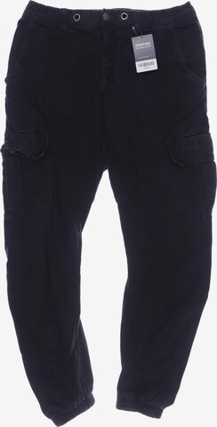 Urban Classics Stoffhose 34 in Schwarz: predná strana