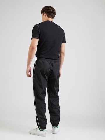Calvin Klein Jeans - Tapered Pantalón en negro
