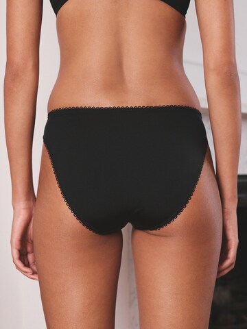 melns Next Biksītes