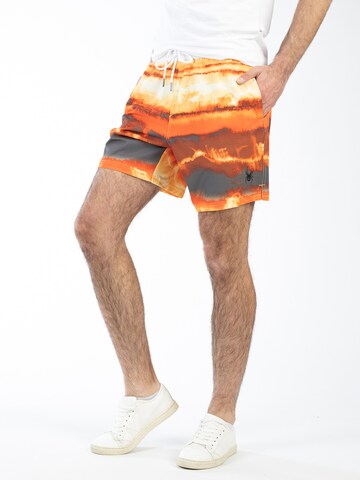 Pantaloni de baie de la Spyder pe portocaliu