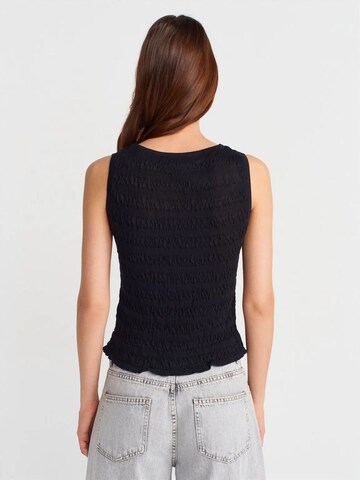Dilvin Bluse‌‌‌‌‌‌‌‌ in Schwarz