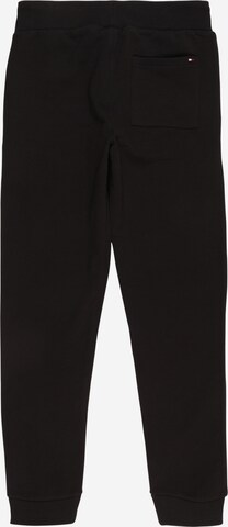 Tapered Pantaloni de la TOMMY HILFIGER pe negru