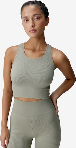 Born Living Yoga Sporttop 'Kitanda' in Groen: voorkant