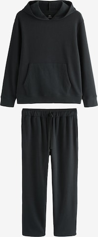 Next Pitkä pyjama värissä musta: etupuoli