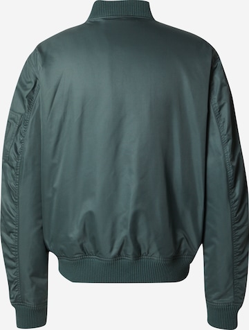 ABOUT YOU x Kingsley Coman Between-Season Jacket 'Colin' in Green