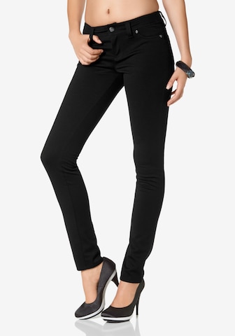 LAURA SCOTT Skinny Pants in Black: front