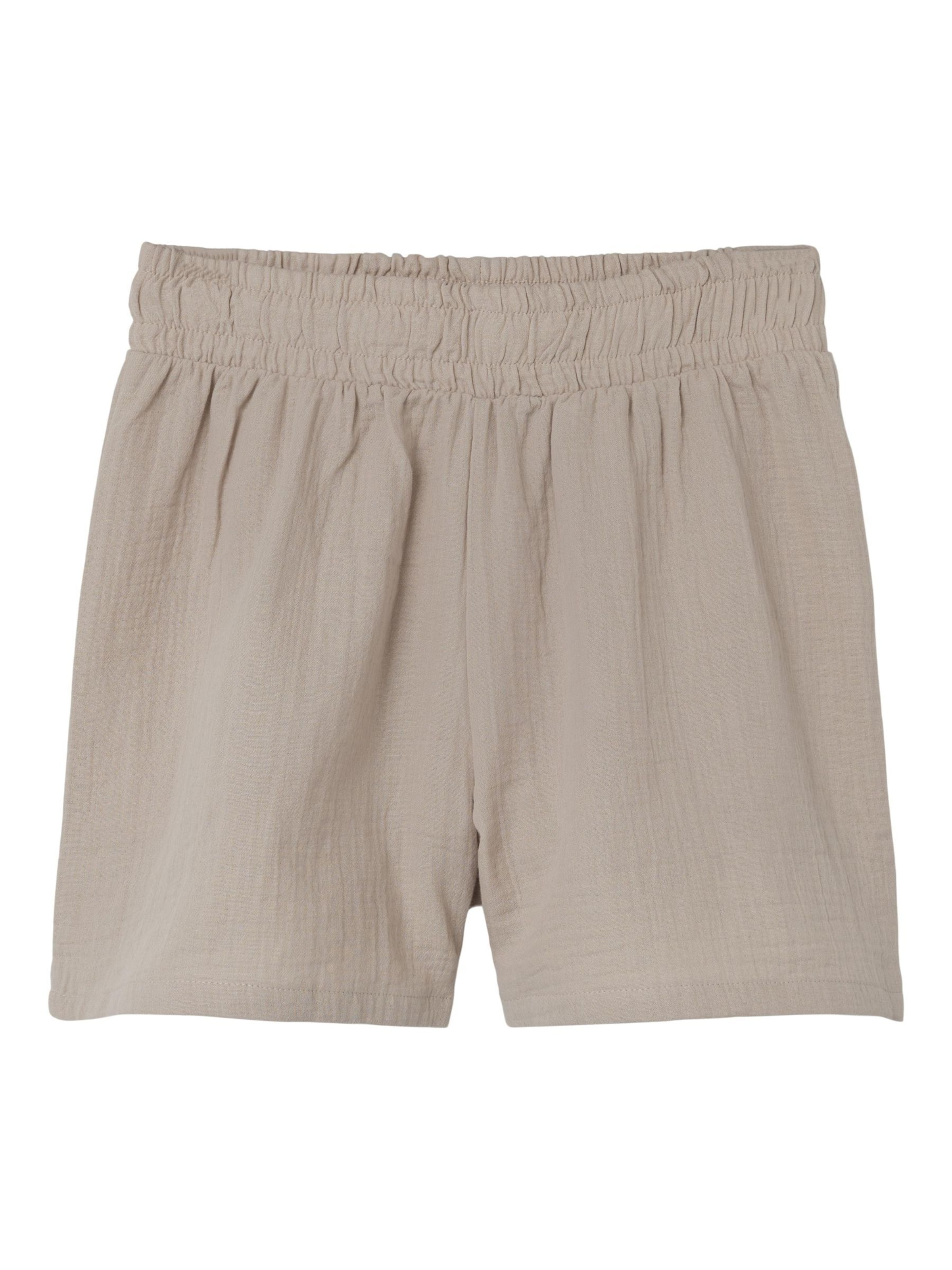 LMTD Loose fit Trousers in Beige: front