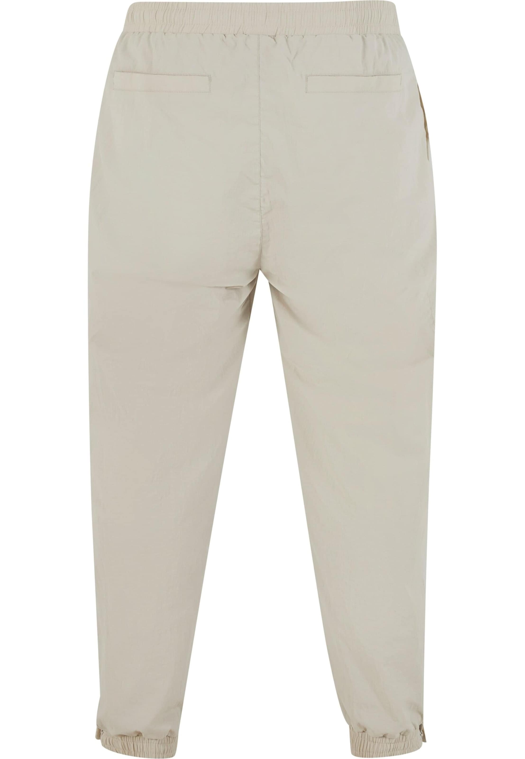Loosefit Pantaloni sportivi 'Patch Essential' di Karl Kani in beige