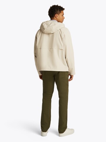 TOMMY HILFIGER Jacke 'TECH HOODED JKT' in Beige
