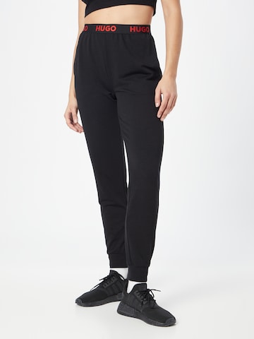 HUGO Red Tapered Pants in Black: front