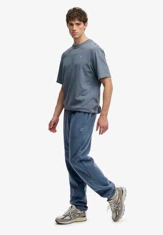 Superdry Tapered Broek in Blauw