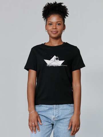 T-shirt 'Astronaut in paper boat' Watapparel en noir : devant