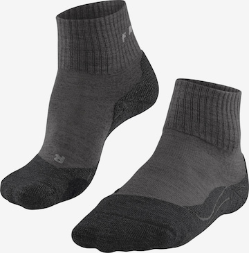 FALKE Athletic Socks 'TK2 Explore Wool Short' in Black: front