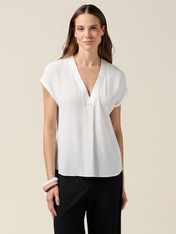 Camicia da donna di oltre in bianco