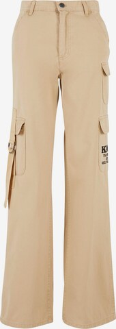 Karl Kani - Loosefit Pantalón cargo en beige: frente