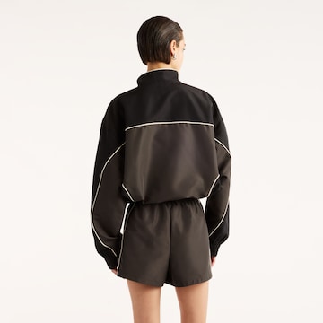 new balance Between-season jacket 'Trackside' in Brown
