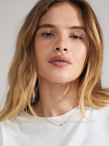 Pilgrim Halsband 'Love Tag' i guld: framsida