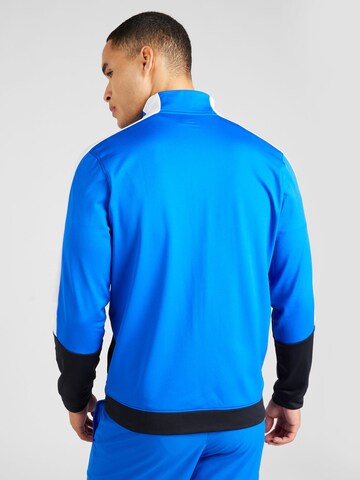 Veste de survêtement UNDER ARMOUR en bleu