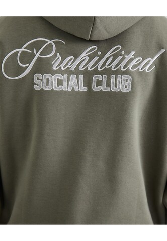 Sweat-shirt Prohibited en vert