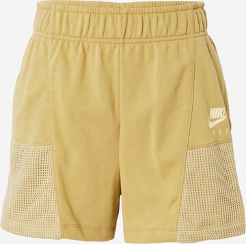 Nike Sportswear Normalny krój Spodnie w kolorze żółty: przód
