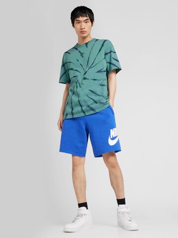 Tricou 'M90 SSNL PREM ESSNTL' de la Nike Sportswear pe verde