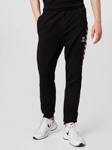 Regular Pantaloni sport de la Hummel pe negru: față