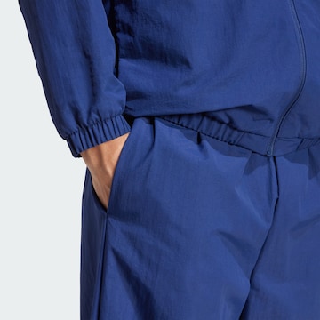 Loosefit Pantaloni sportivi 'Essential' di ADIDAS SPORTSWEAR in blu