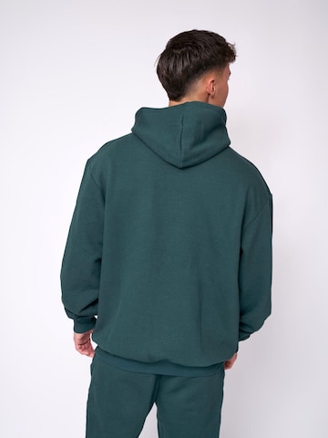 Pull-over 'Essential Oversized Hoodie' Fortex Fitness en vert
