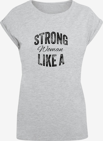 Maglietta 'WD - Strong Like A Woman' di Merchcode in grigio: frontale