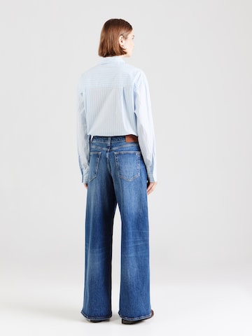 Tommy Jeans Zvonové kalhoty Džíny 'DAISY' – modrá