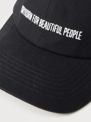 DRYKORN Keps 'JESPER 888' i svart