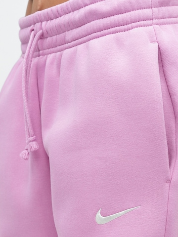 Nike SportswearTapered Hlače 'Phoenix' - roza boja