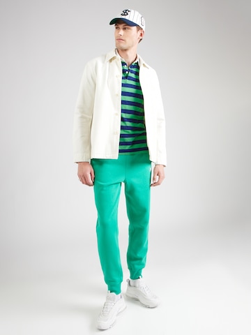 Nike Sportswear Конический (Tapered) Штаны 'CLUB' в Зеленый