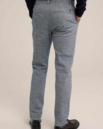 WE Fashion - Slimfit Pantalón chino en azul